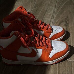 NIKE Dunks, Great condition, barely used NIKE Dunks. Size w 8.5. Orange & white.